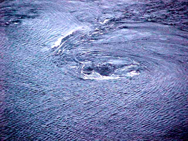 Another example of the created whirlpools in the water, as seen from the bridge.