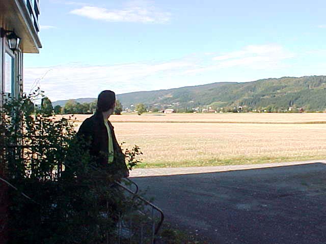 Ruben van Tienen leaving the house for some shopping. At that field next to the house, the NATO will place some of the 2,000 soldiers of the total 20,000 who will be practicing in the valley here the coming winter. Of course, future plans of an attack somewhere on this planet, will withdraw the 500 thanks driving down the road...