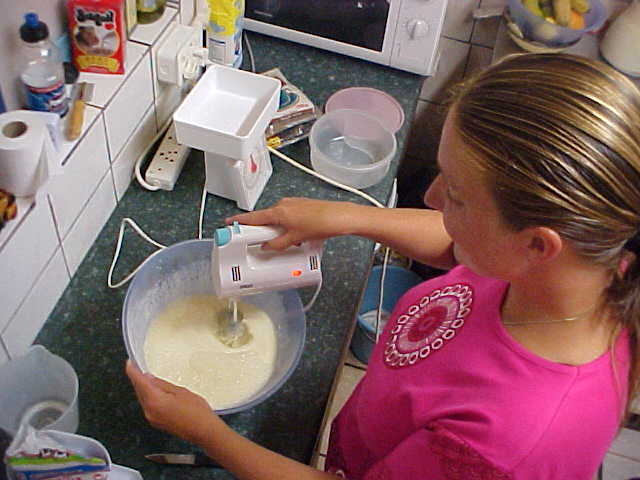 Back at Albergo For Backpackers where Mirjam prepares the dough for the Dutch pancakes.