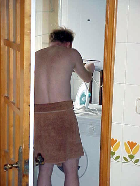 Ah, another one awake. Gerben finds out how to change the shower from cold to warm by changing the heating system. 