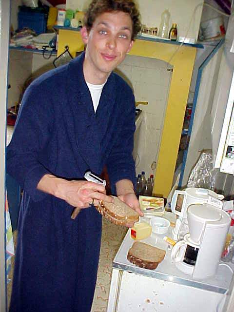 The boyfriend of my housemate Anne-Marie, Dennis, prepares toasted sandwiches, for us.