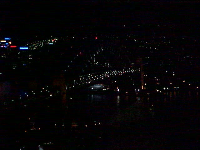 The skyline as seen from the rotating restaurant of the 47th floor of Australian Square. Do you see the Sydney Harbour Bridge?
