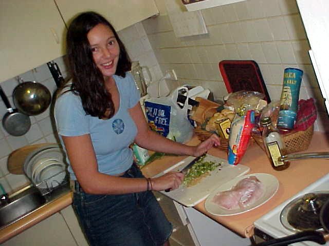 Bronwyn preparing a nice meal with rice and fish.