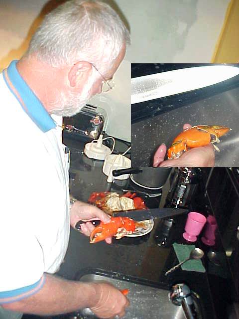 Norm prepared a seafood rice dish with these crabs. He breaks the crab open with a knife. Mmmm.