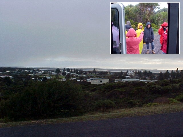 Getting ready for a walk just outside of Beachport. Everybody wearing a raincoat.