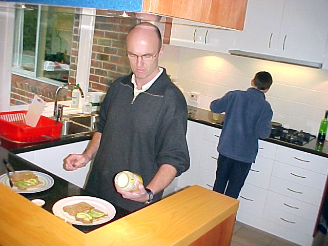 At their home in Beaumaris: Menno prepares me a sandwich...