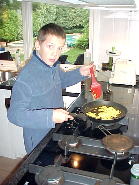 Son Jop prepares me scrambled eggs...