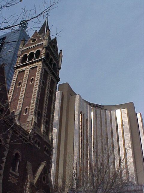 The Hyatt Hotel next to a historic church.