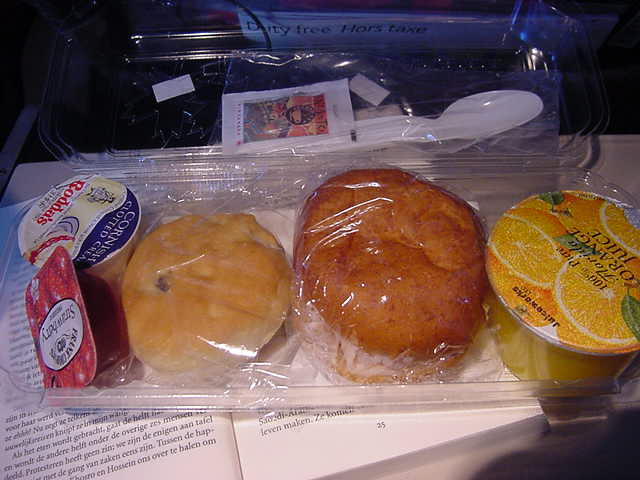 I had a few bites on the plane, the last one was this afternoon snack. Is it a Canadian thing to put Cornish clotted cream ON strawberry jam? I kinda like it!