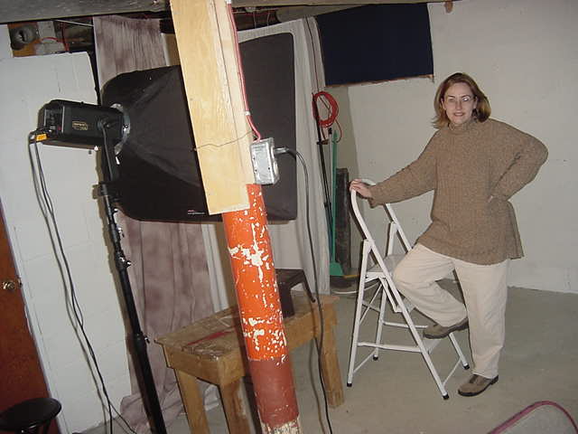 Angela is a photographer and has a tiny studio in the basement.