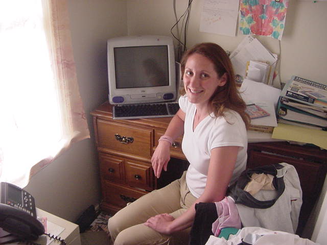 Beth uses the internet on her iMac (bleh! hehe) hidden in the back of her bedroom.