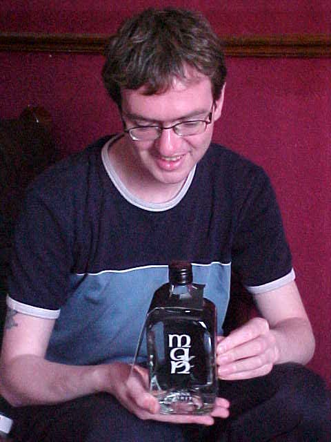Jim with The Gift from the Isle of Man: triple distilled real Manx Whiskey!