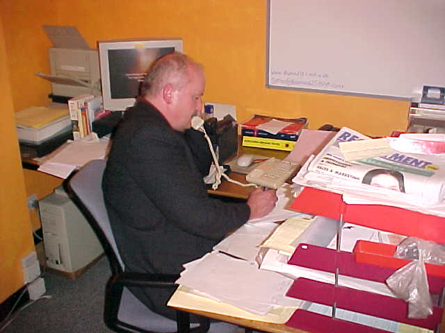 Simon Shiels working at his home office in Belfast.